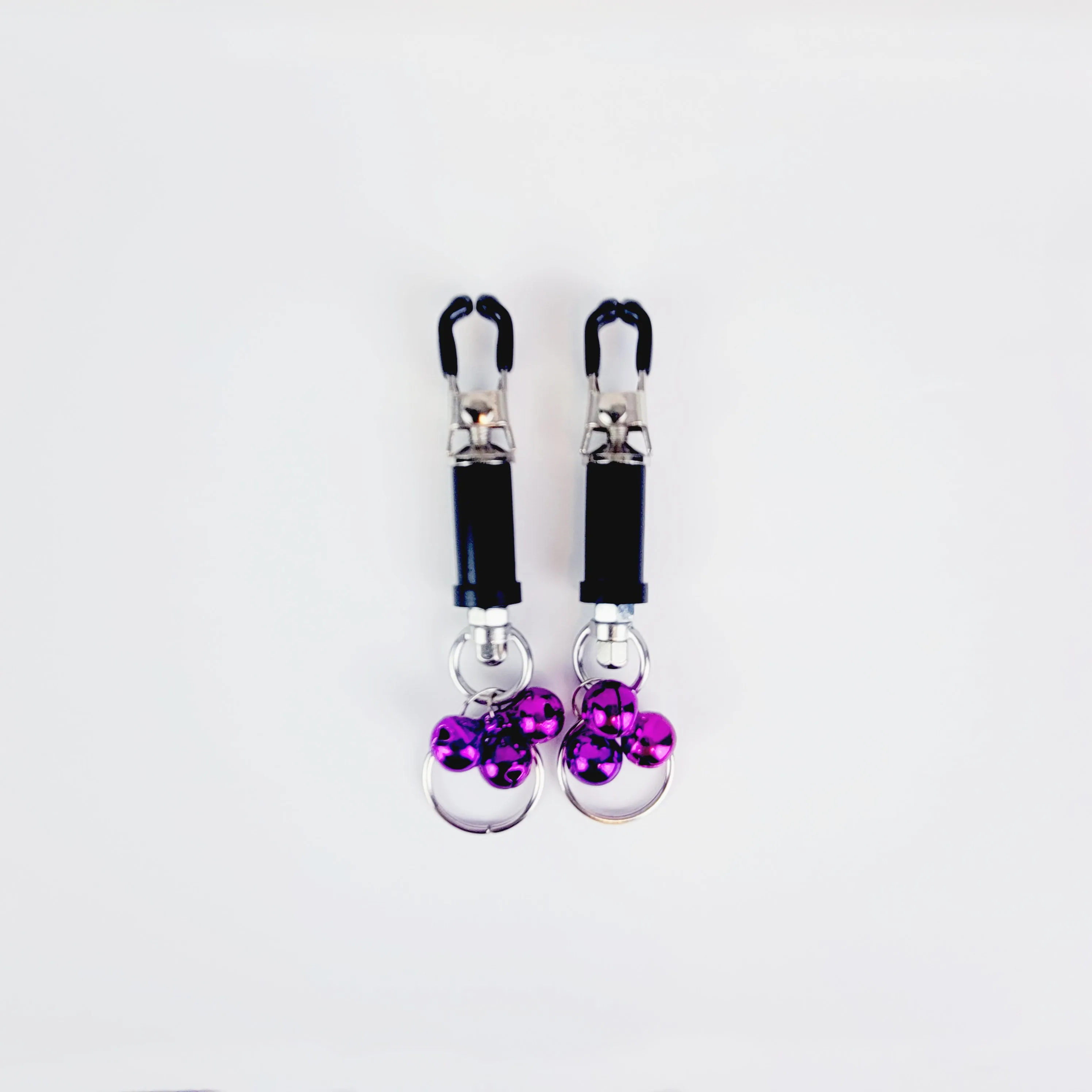 BDSM Nipple Clamps. Barrel Nipple Clamps with Bells and Pull Rings. MATURE